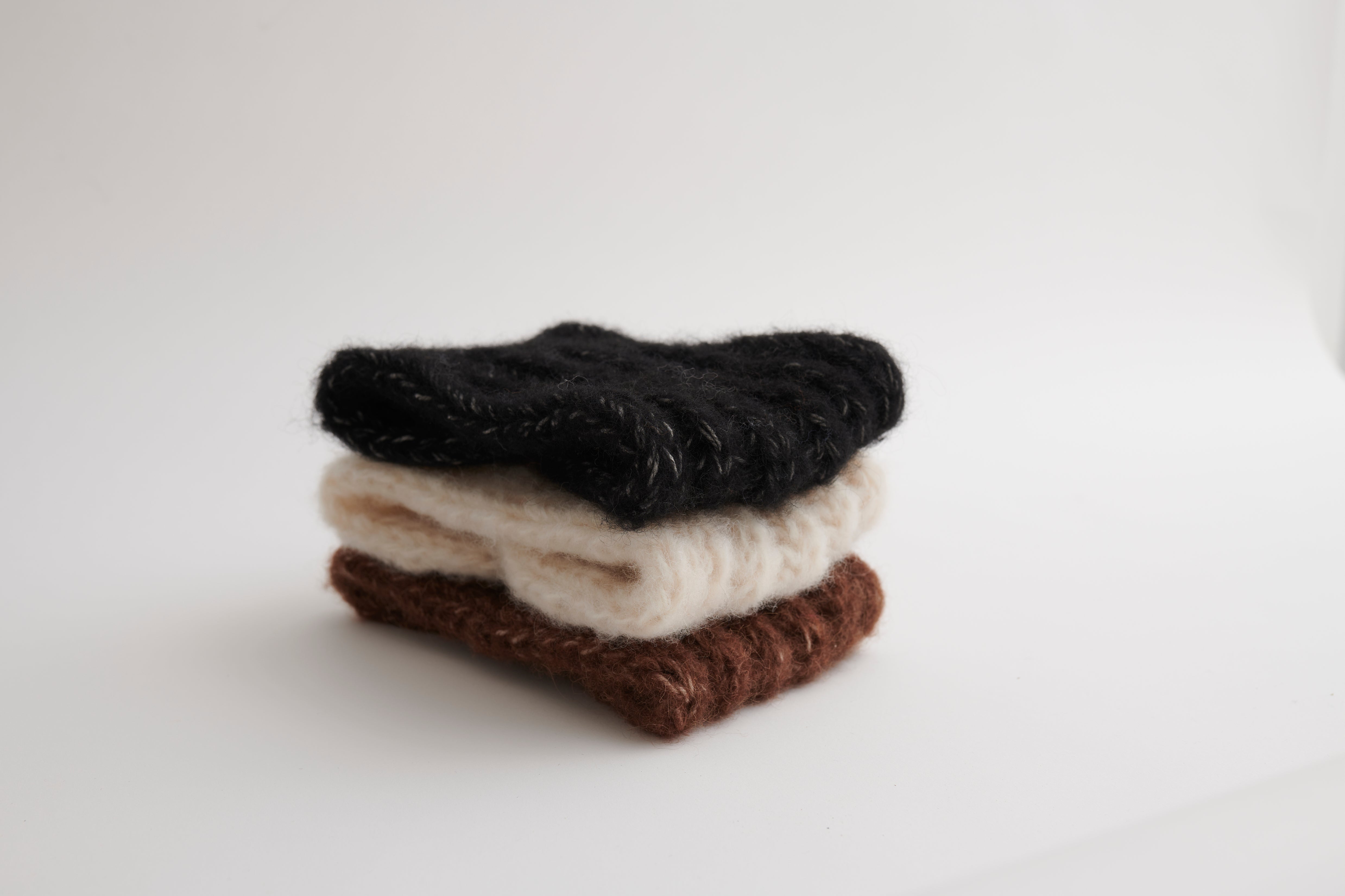 Babyalpaka Stirnband schwarz meliert