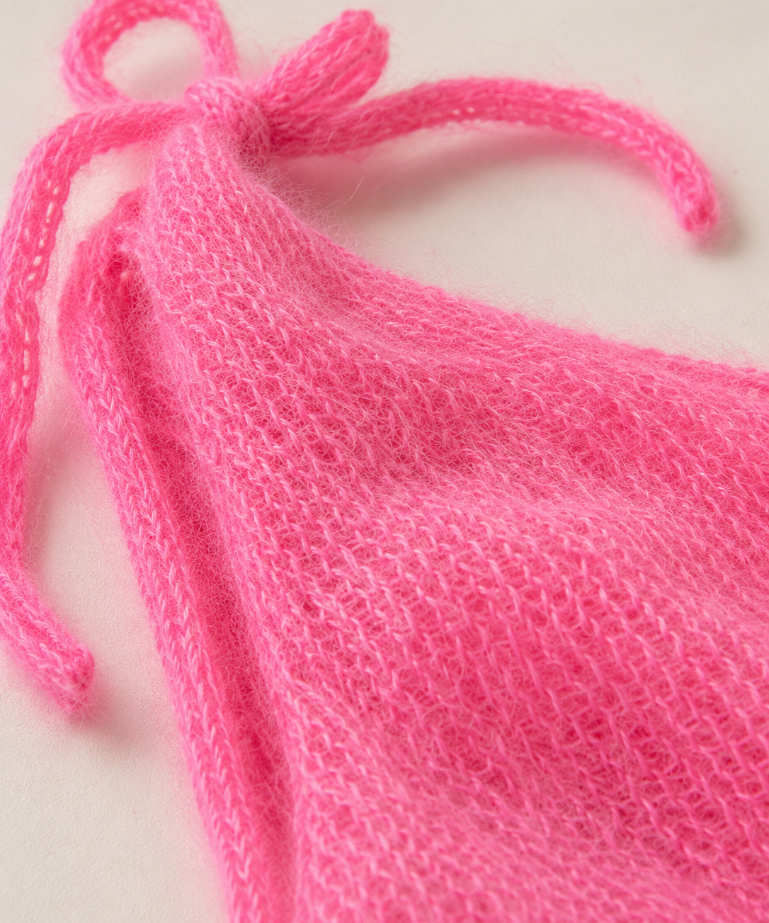 Stricktop mit Schleifen hot pink