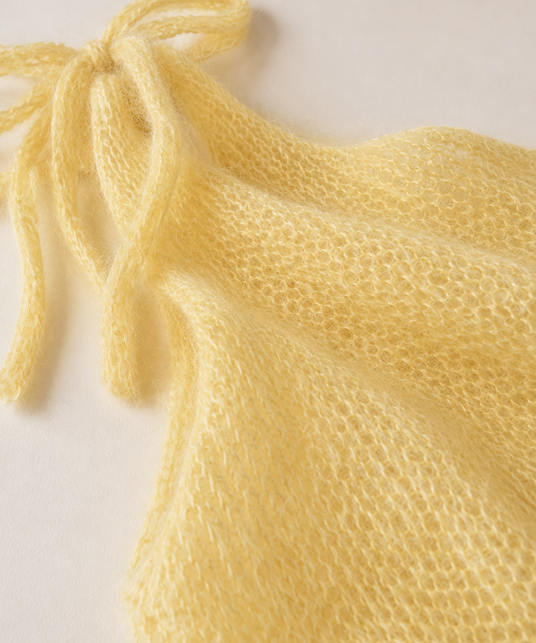Stricktop mit Schleifen buttnernut yellow